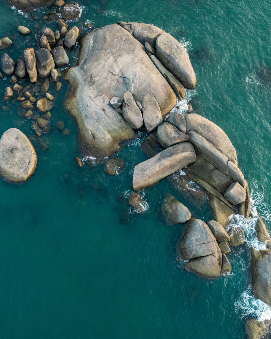 Rugged earth meets the endless blue