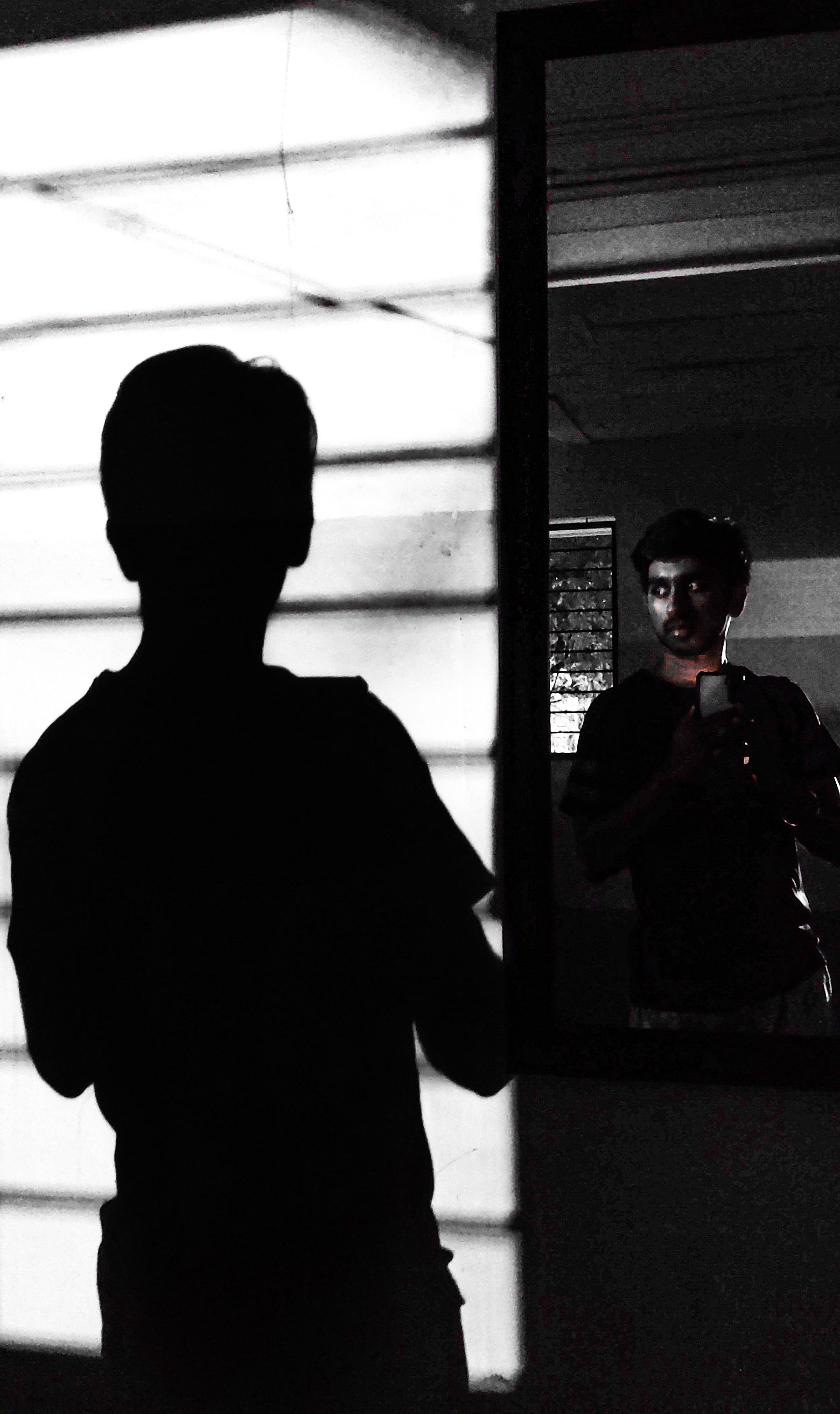 between shadow and light