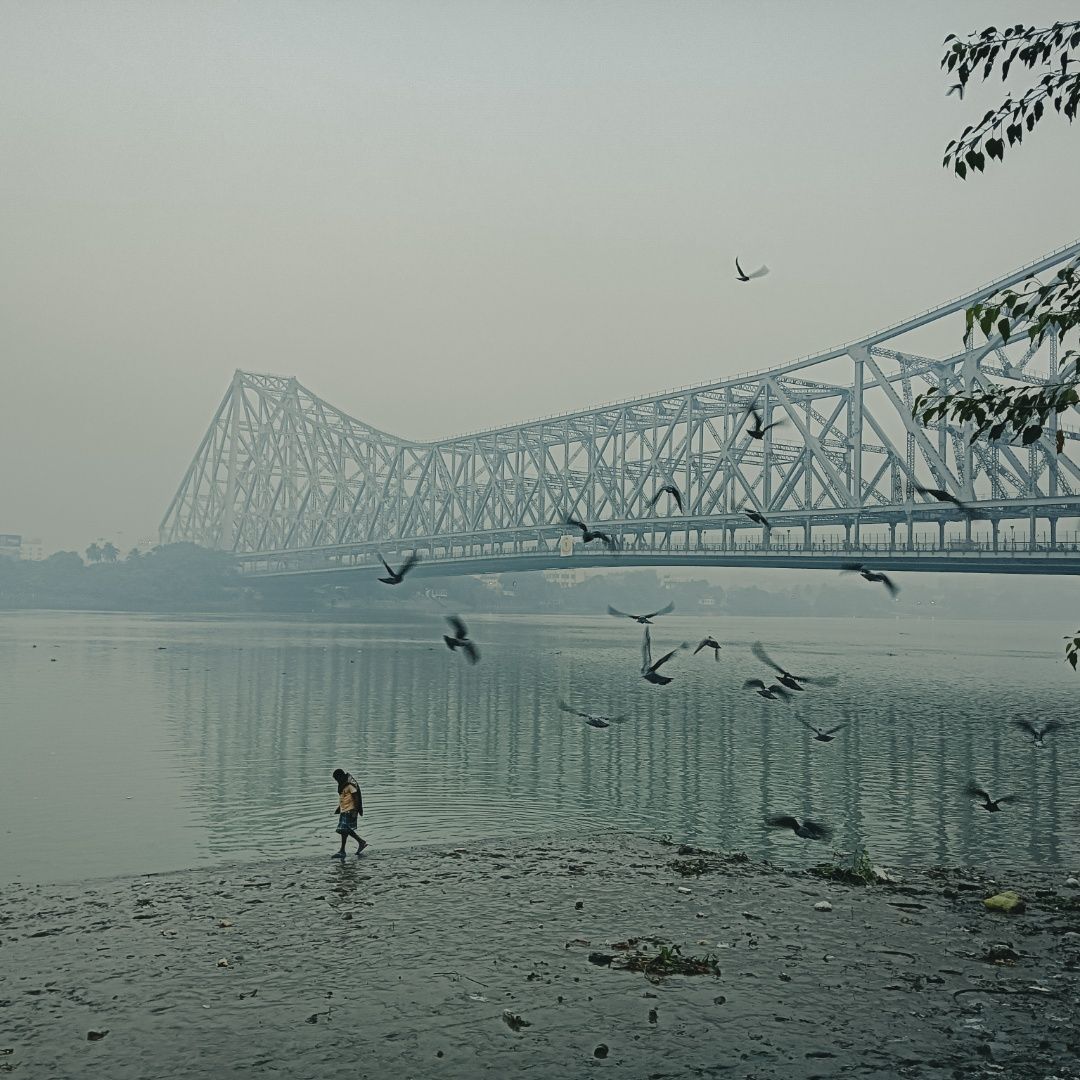 In Winter Morning A Man Walks Through The Bridge